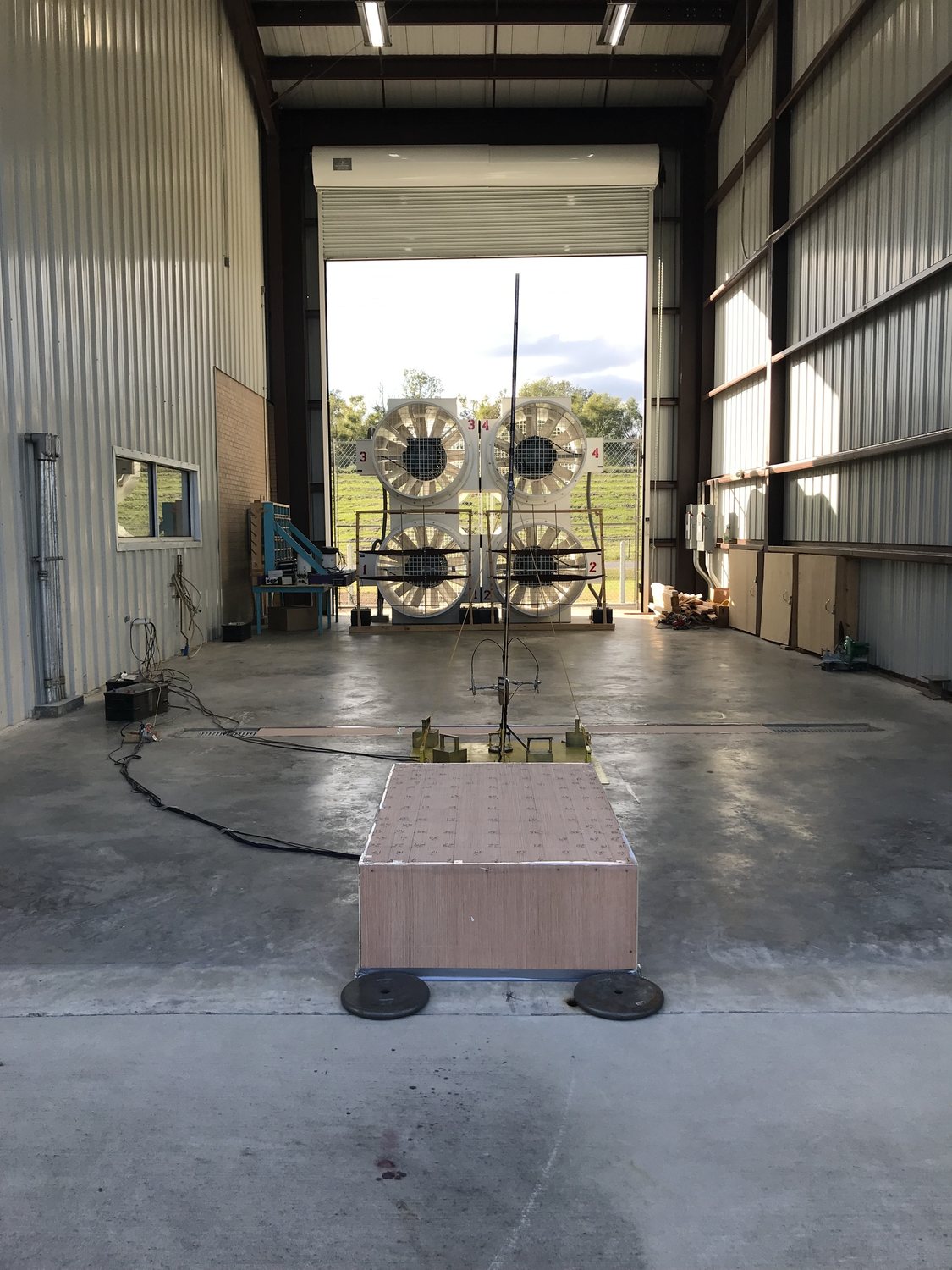 The open-jet testing hall, with a building model in front of the fan array