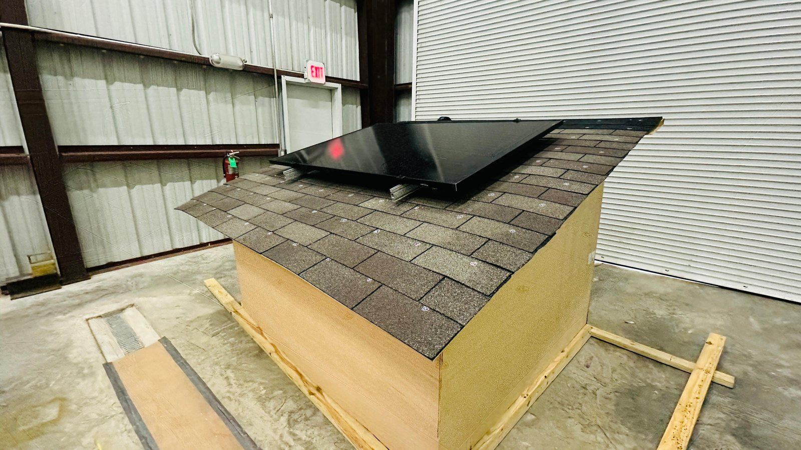 The mono-slope roof building with its rooftop solar panel